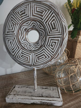 CARVED DISC